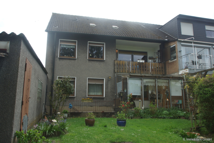 Balkon und Wintergarten Gartenseite